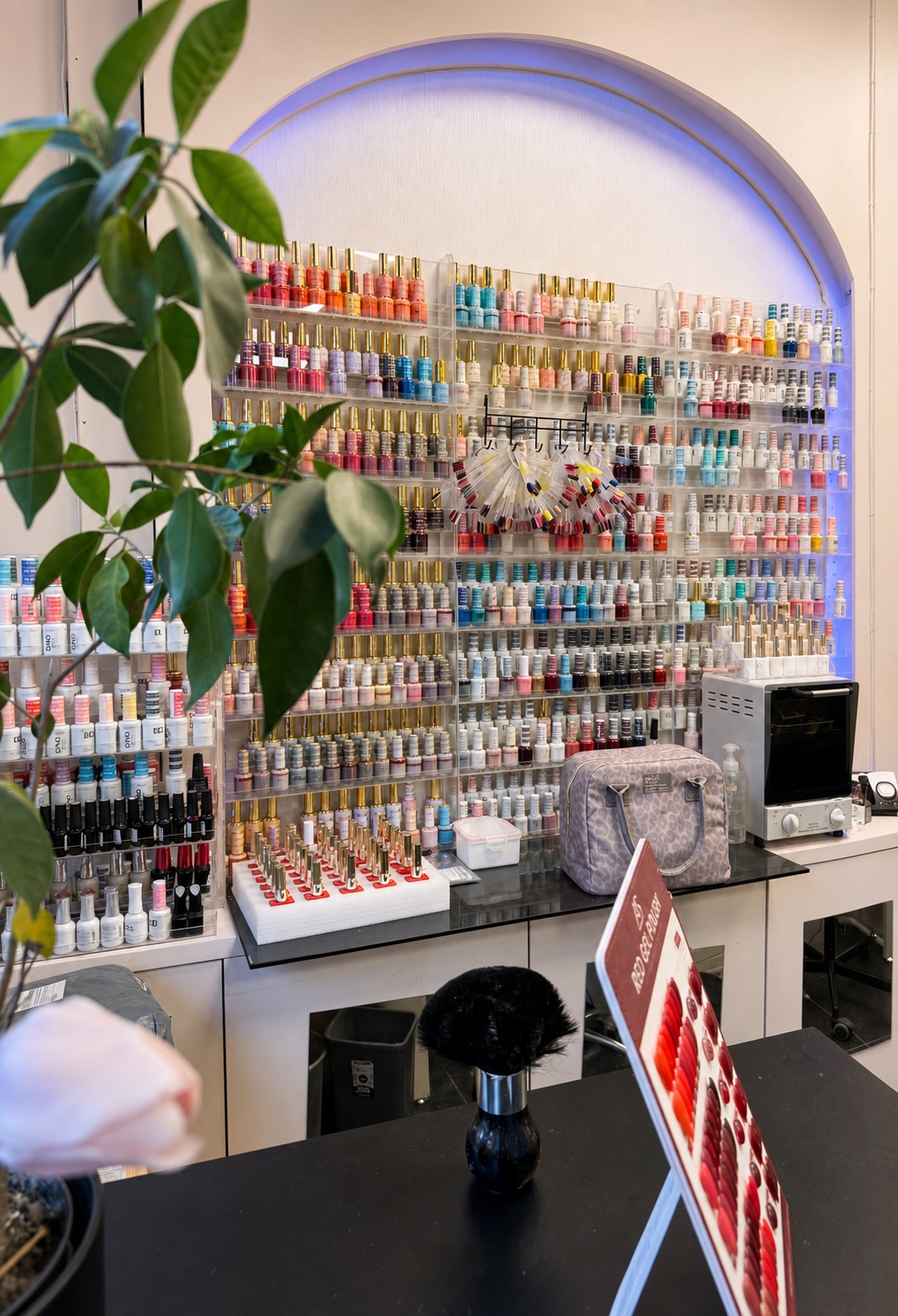 Extensive nail polish collection at Chic Salon & Clinic.
