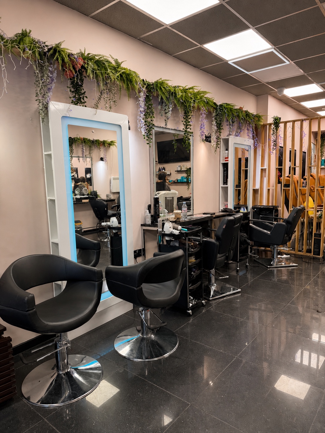 Bright hair styling area at Chic Salon & Clinic.