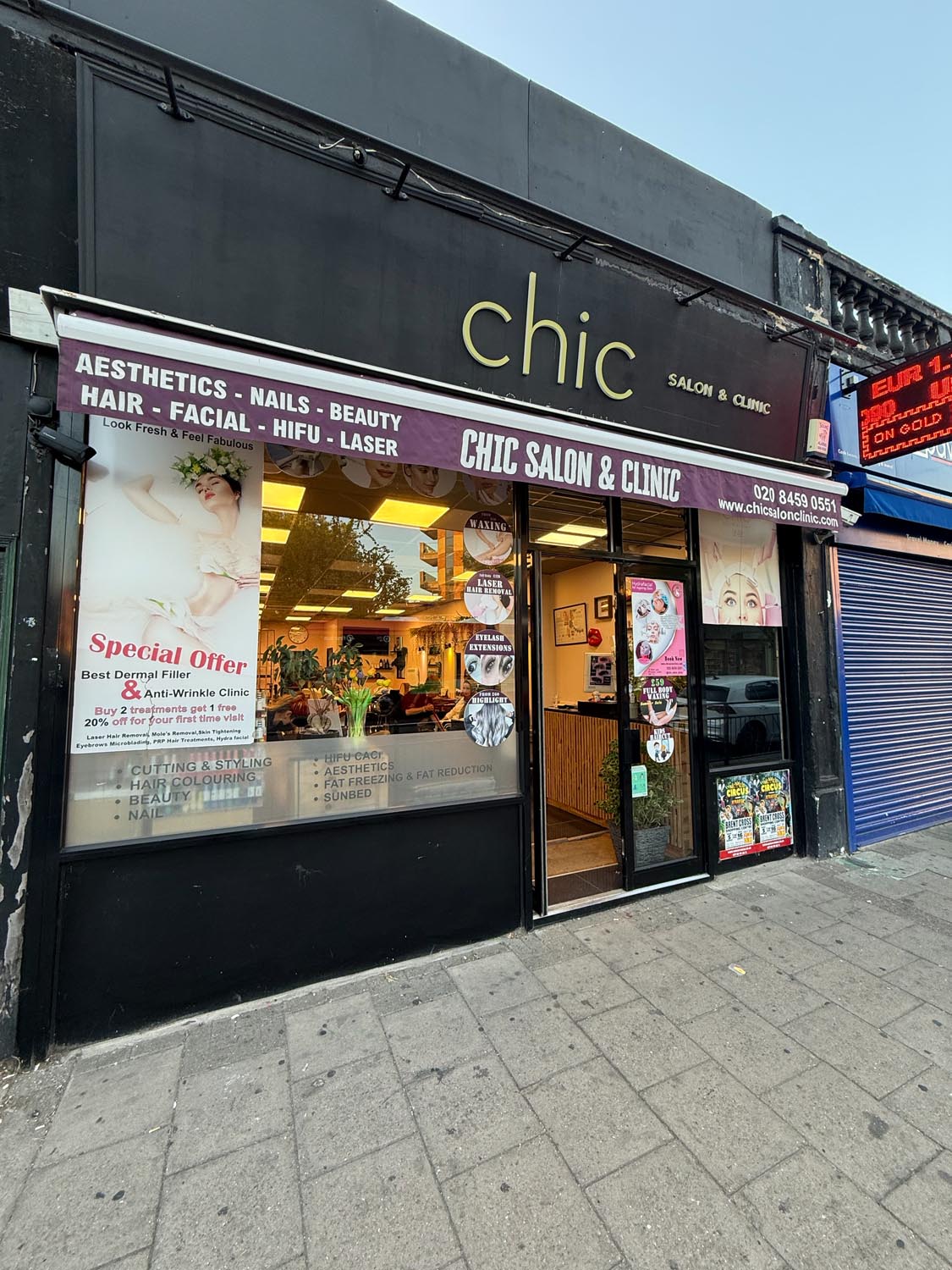 Shopfront of Chic Salon & Clinic on Walm Lane, Willesden Green, with awning listing aesthetics, nails, beauty, hair, facial, HIFU and laser.